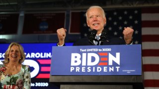 In this Feb. 29, 2020, file photo, Democratic presidential candidate former Vice President Joe Biden reacts on stage with his wife Jill Biden after declaring victory in the South Carolina presidential primary in Columbia, South Carolina.