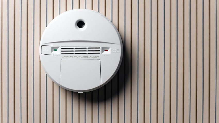 smoke detector and carbon monoxide alarm mounted on wall