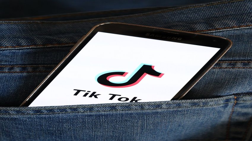 POLAND – 2021/03/22: In this photo illustration, a Tik Tok logo seen displayed on a smartphone. (Photo Illustration by Filip Radwanski/SOPA Images/LightRocket via Getty Images)