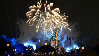 fireworks fill the sky at the Magic Kingdom at Walt Disney World