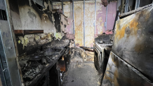 charred remains of Brooklyn apartment kitchen