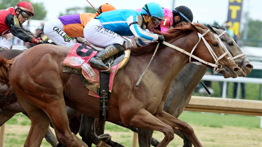 Mage #8, ridden by jockey Javier Castellano races during the 149th running of the Kentucky Derby at Churchill Downs on May 06, 2023 in Louisville, Kentucky.