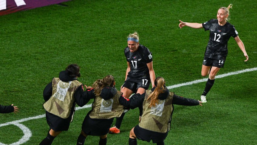 New Zealand’s forward #17 Hannah Wilkinson (C) celebrates with teammates after scoring the team’s first goal during the Australia and New Zealand 2023 Women’s World Cup Group A football match between New Zealand and Norway at Eden Park in Auckland on July 20, 2023. (Photo by Saeed KHAN / AFP) (Photo by SAEED KHAN/AFP via Getty Images)