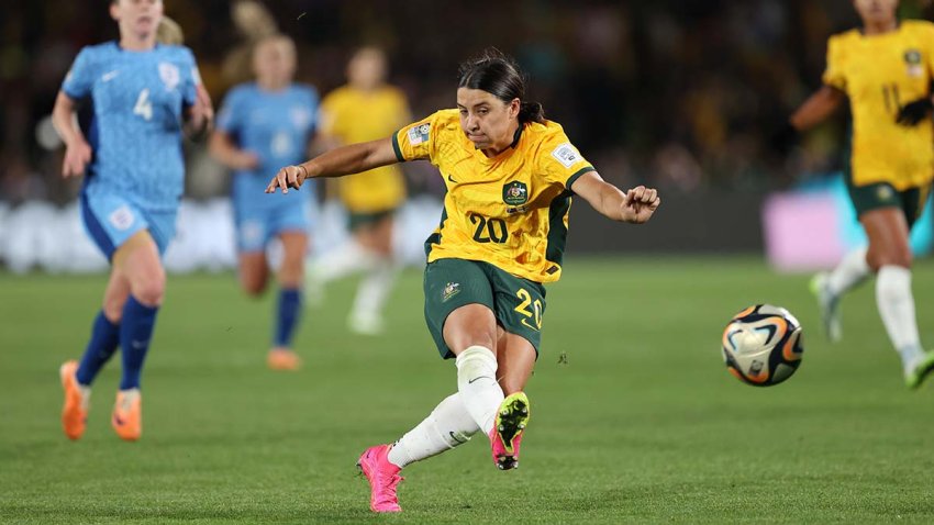 SYDNEY, AUSTRALIA – AUGUST 16: Sam Kerr of Australia scores her team’s first goal during the FIFA Women’s World Cup Australia & New Zealand 2023 Semi Final match between Australia and England at Stadium Australia on August 16, 2023 in Sydney, Australia. (Photo by Brendon Thorne/Getty Images)