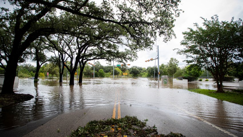 HOUSTON, TEXAS – JULY 8: Buffalo Bayou floods onto Allen Parkway after Beryl made landfall early morning Monday, July 8, 2024, in Houston. (Ishika Samant/Houston Chronicle via Getty Images)