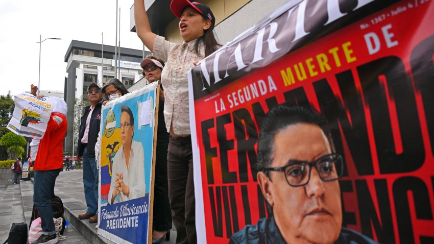 Supporters of Fernando Villavicencio shout slogans as they await the sentencing at the trial against the five alleged murderers of former Ecuadorian presidential candidate Fernando Villavicencio at the Judicial Complex in Quito on July 12, 2024.¬† (Photo by Rodrigo BUENDIA / AFP) (Photo by RODRIGO BUENDIA/AFP via Getty Images)