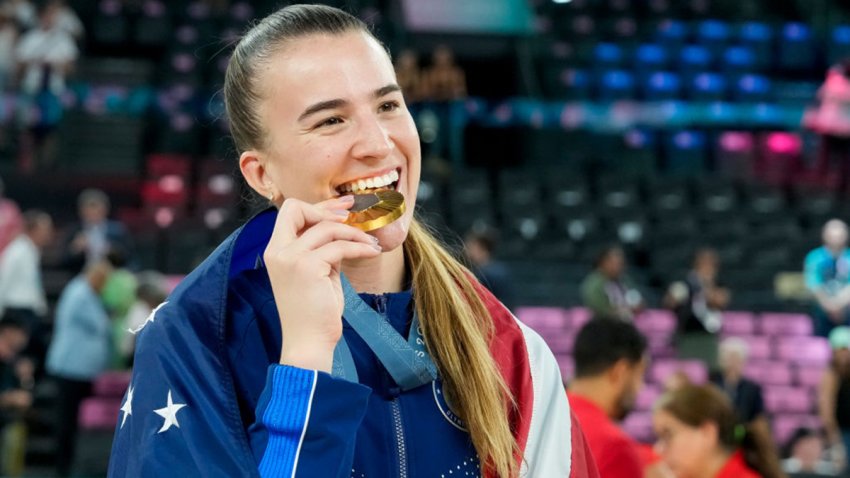 PARIS, FRANCE – AUGUST 11: Sabrina Ionescu of United States poses with her gold medal during the ceremony after winning the Women’s Gold Medal Game, Game 52, France vs United States of America on day sixteen of the Olympic Games Paris 2024 at Arena Bercy on August 11, 2024 in Paris, France. (Photo by Daniela Porcelli/Eurasia Sport Images/Getty Images)