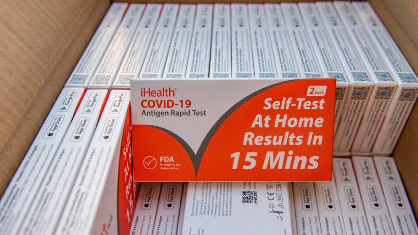 Rapid at-home Covid-19 test kits are ready to be distributed by the GreenRoots environmental protection organization and Chelsea Community Connections in Chelsea, Massachusetts, on December 17, 2021. – Each kit contains two test and each person is given enough for their entire family. Cities and towns across Massachusetts are receiving the free tests as part of a state government strategy to control the spread of the virus this holiday season. Massachusetts is distributing 2.1 million of the rapid tests.  (Photo by JOSEPH PREZIOSO/AFP via Getty Images)