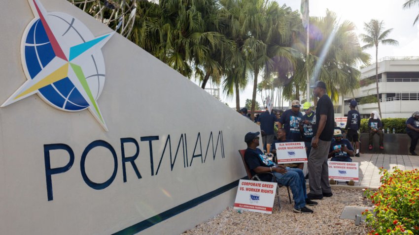 Workers picket outside the Port of Miami in Miami, Florida, US, on Tuesday, Oct. 1, 2024. Dockworkers walked out of every major port on the US East and Gulf coasts for the first time in nearly 50 years, staging a strike that could ripple across the world’s largest economy and cause political turmoil just weeks before the presidential election. Photographer: Eva Marie Uzcategui/Bloomberg via Getty Images