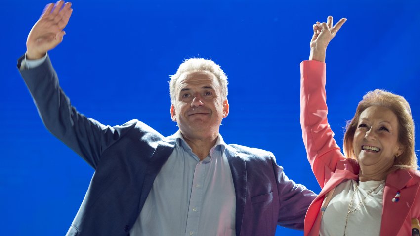 22 October 2024, Uruguay, Montevideo: The presidential candidate from the left-wing Frente Amplio party alliance, Yamandu Orsi, and Carolina Cosse, who is running for vice president, during a rally five days before the Uruguayan elections. Photo: Santiago Mazzarovich/dpa (Photo by Santiago Mazzarovich/picture alliance via Getty Images)