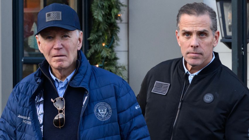 A November 29, 2024 photo shows US President Joe Biden and son Hunter Biden stepping out of a bookstore while shopping in Nantucket, Massachusetts on November 29, 2024. Biden on Sunday issued an official pardon for his son Hunter, who is facing sentencing for two criminal cases related to tax evasion and the purchase of a firearm. (Photo by Mandel NGAN / AFP) (Photo by MANDEL NGAN/AFP via Getty Images)