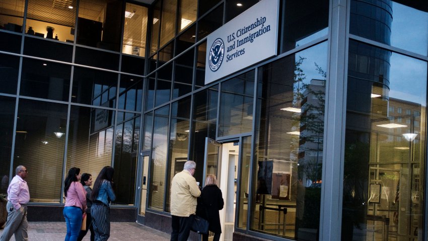 FAIRFAX, VIRGINIA – APRIL 22: People enter the Citizenship and Immigration Services office in the early morning hours on Monday, April 22, 2019 in Fairfax, Virginia. (Photo by Pete Marovich For The Washington Post via Getty Images)