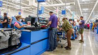 Miami, Hialeah Gardens, Florida, Walmart Supercenter, checkout line cashier, customers paying.