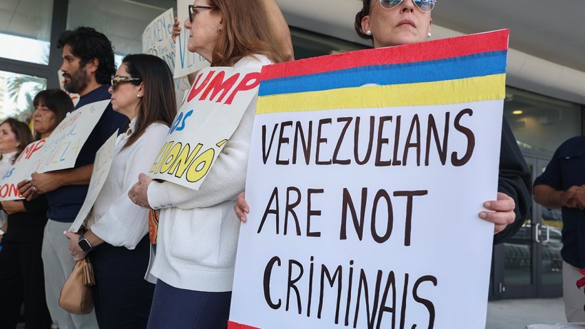 MIAMI, FLORIDA – FEBRUARY 13: Maca Iglesias (R) joins with others to support a resolution in favor of reinstating temporary protected status for Venezuelans on February 13, 2025 in Miami, Florida. In early February,  President Donald Trump’s administration revoked temporary protected status for around 350,000 Venezuelans who fled the country and immigrated to the United States.  (Photo by Joe Raedle/Getty Images)