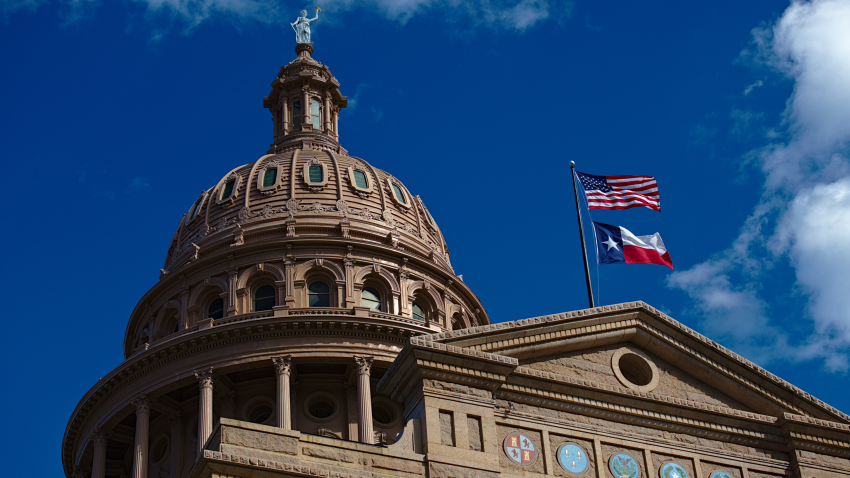 The pink marble granite Texas Capitol building is located at the end of Congress Avenue in downtown Austin, Texas