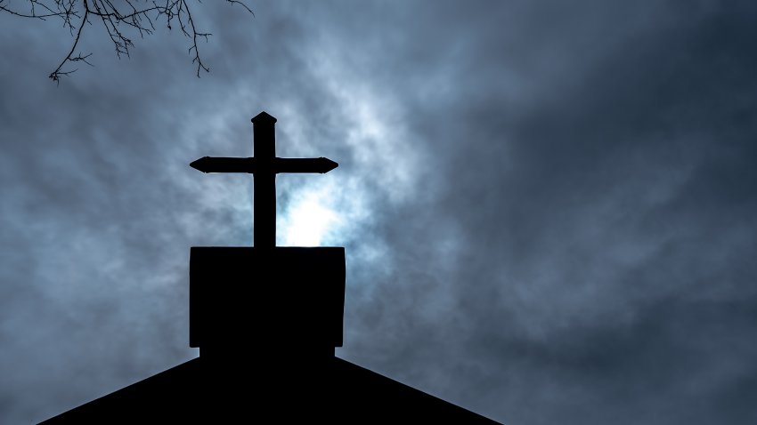 Christianity religion, Cross at the church of the Christian faith on Halloween night.