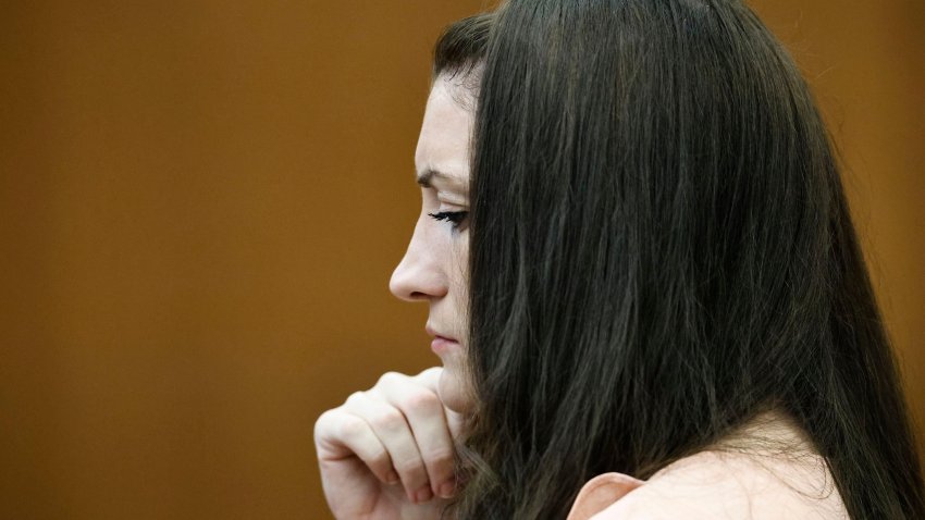Defendant Lindsay Clancy wipes away tears as she listens to testimony.